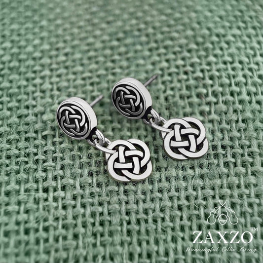 Tiny irish silver Dara knot earring with platinum post. Celtic eternity knot jewelry.