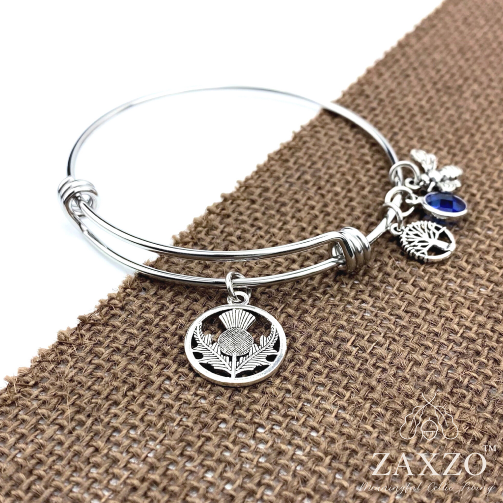 Thistle Birthstone Bangle with Bee and Tree Charm.